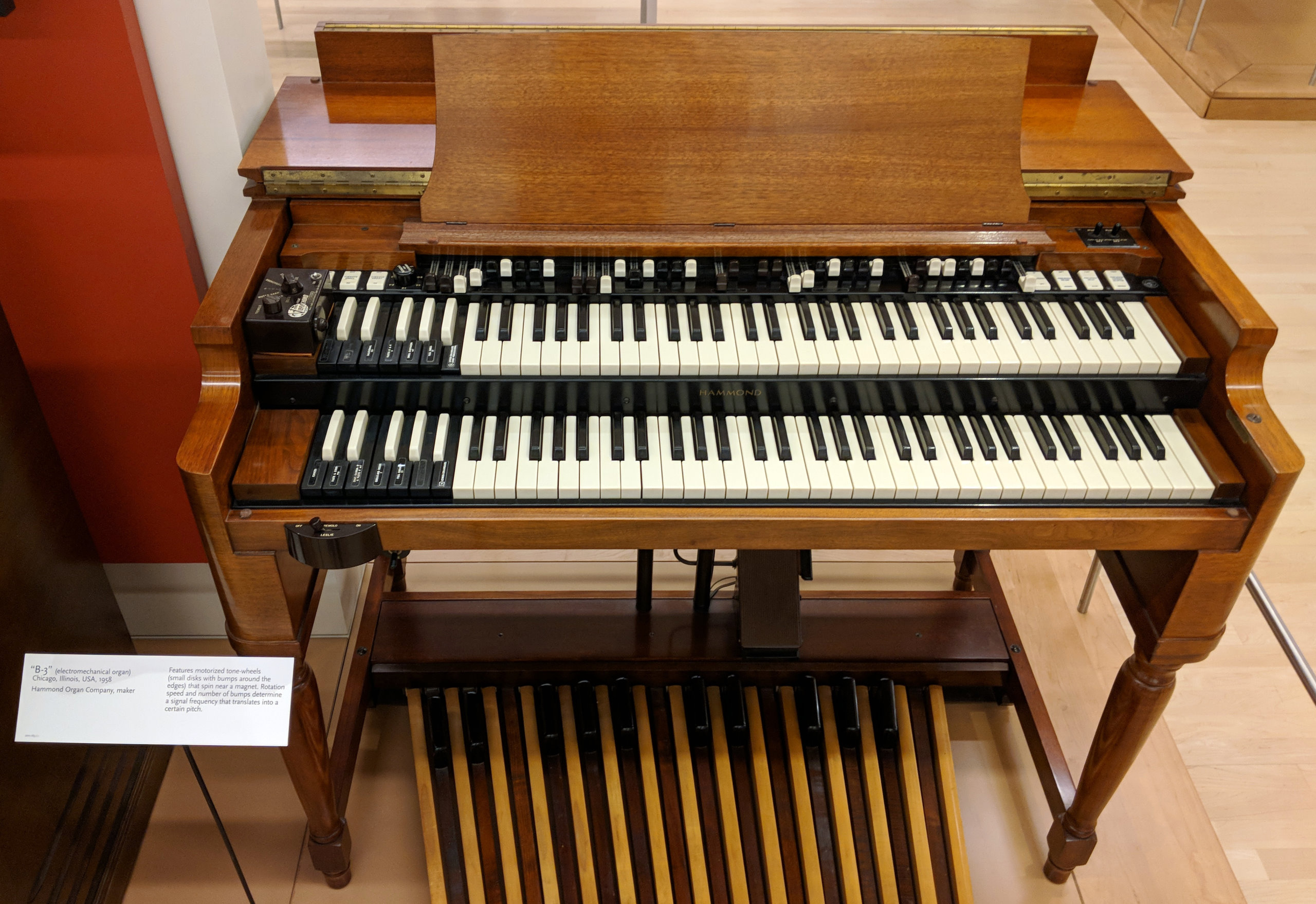 Photo of a Hammond B3 organ taken at Musical Instrument Museum (Phoenix, AZ), showing both manuals, drawbars, and pedals